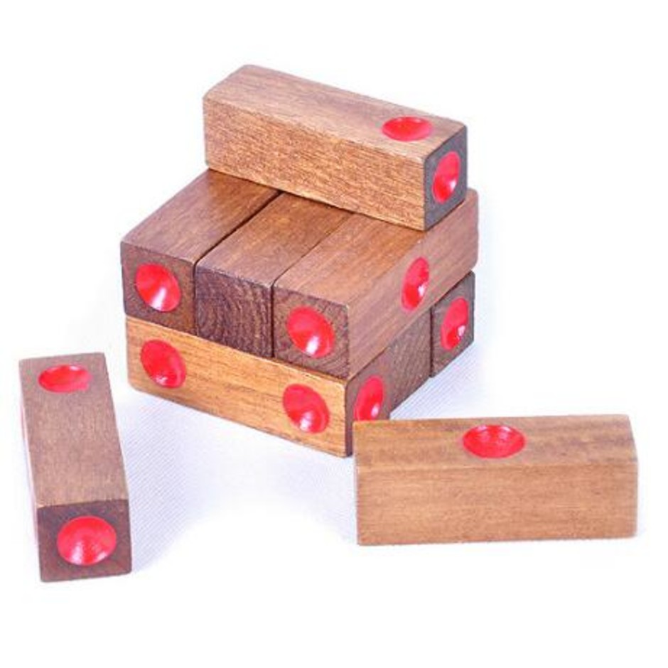 casse tête en bois cube point rouge